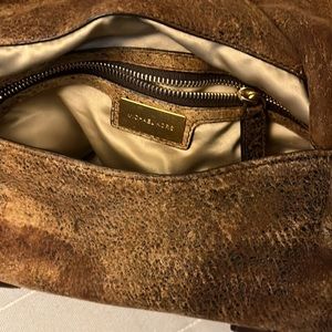 Michael Kors crossbody in original distressed calfskin leather .